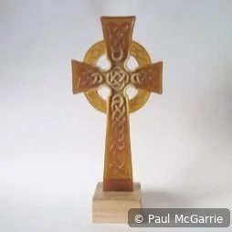 Celtic Cross in Amber, fused glass artwork by Paul McGarrie, photograph 1