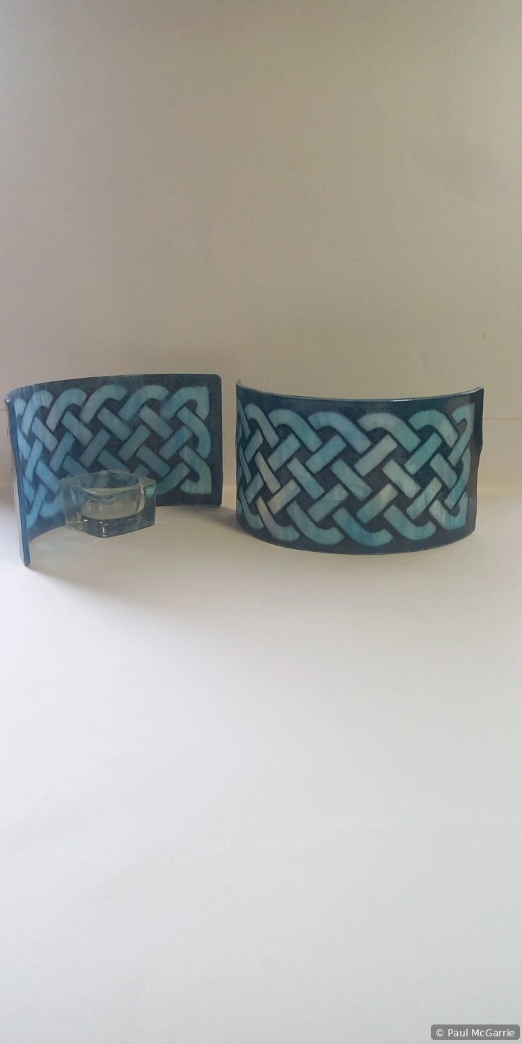 Celtic Knot Holders in Blue, fused glass artwork by Paul McGarrie, photograph 1